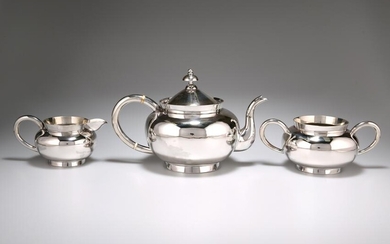 A CHINESE SILVER THREE PIECE TEA SERVICE, by Wang Hing
