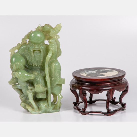 A Chinese Carved Celadon Jade Figural Group