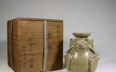A Chinese Carved Glazed Porcelain Jar with Wooden Box