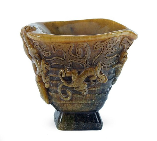 A Chinese Carved Horn Libation Cup.