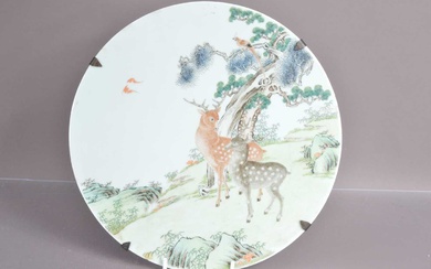 A Chinese Qing dynasty famille rose porcelain wall plaque
