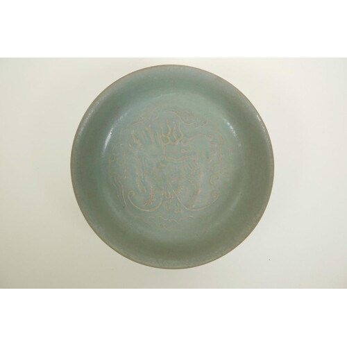 A Chinese Song style celadon glazed porcelain bowl with rais...