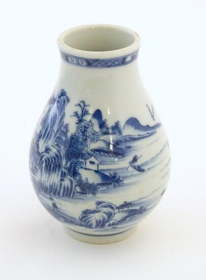 A Chinese blue and white vase decorated with a