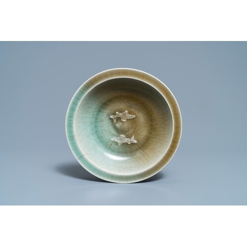 A Chinese celadon 'twin fish' dish, Song/YuanDescription:Dia...