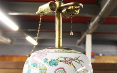 A Chinese hand painted porcelain jar mounted as a table lamp base, H. 62cm.