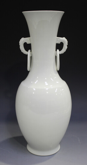 A Chinese white glazed porcelain vase, probably 20th century, the ovoid body beneath a waisted narro