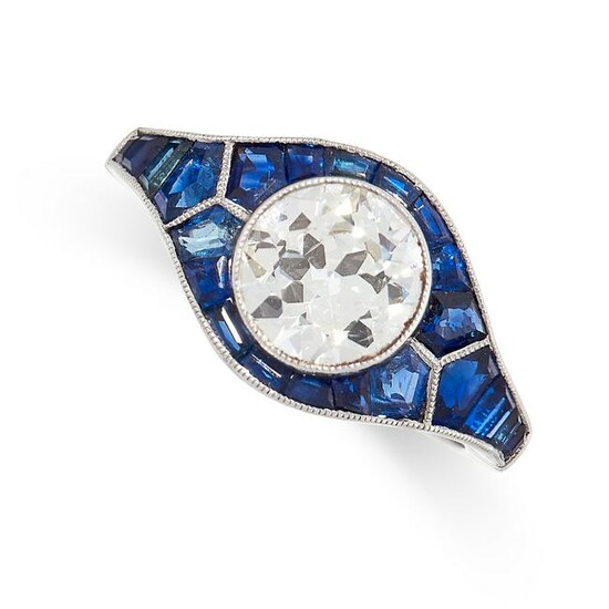 A DIAMOND AND SAPPHIRE DRESS RING in platinum, set to