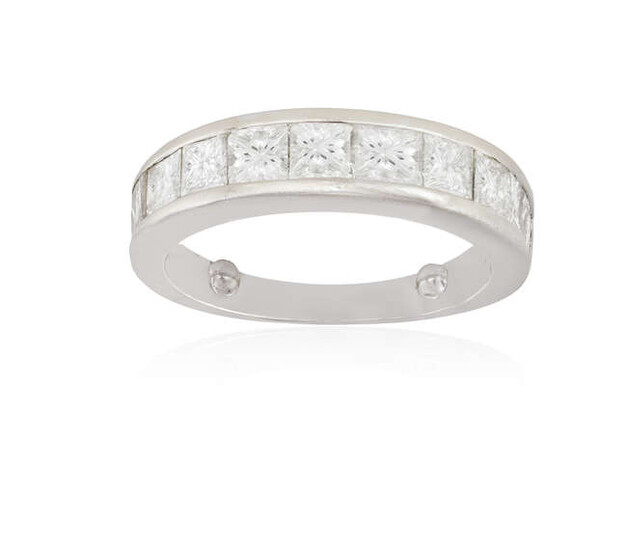 A DIAMOND HALF-ETERNITY RING The frontispiece set with...