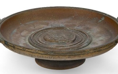 A French bronze tazza, cast by Barbedienne, c.1870, the shallow dish with central relief depicting a classical male profile, inscribed F.BARBEDIENNE, 20cm wide
