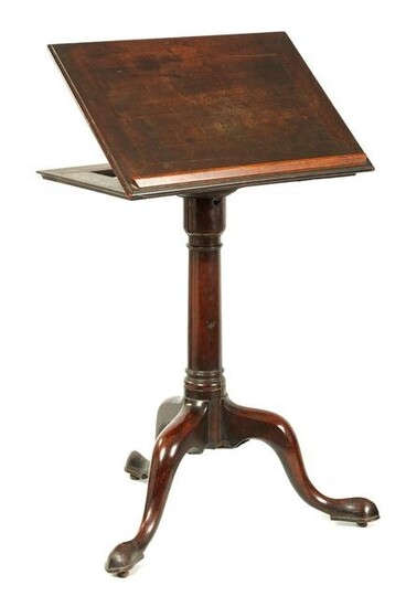 A GEORGE II MAHOGANY ADJUSTABLE READING TABLE with