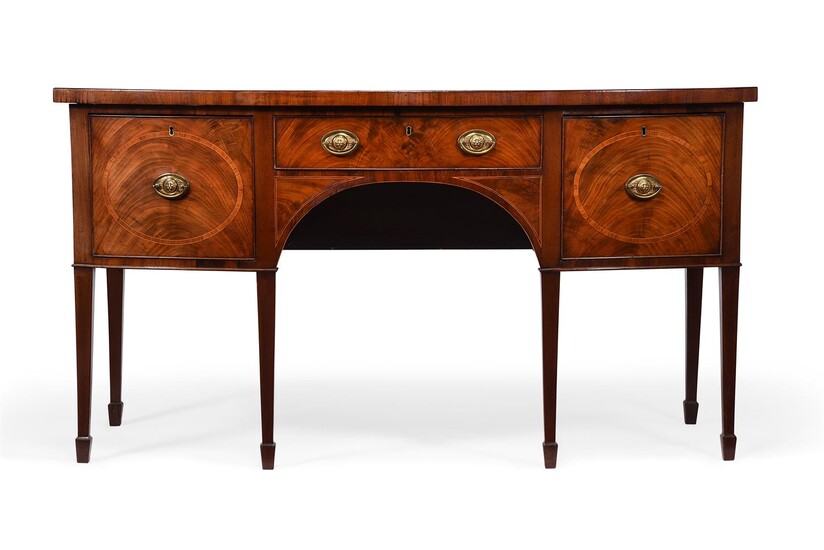 A GEORGE III MAHOGANY AND CROSSBANDED BOWFRONT SIDEBOARD, IN THE MANNER OF GILLOWS, CIRCA 1800