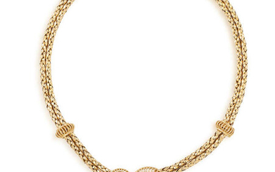 A GOLD NECKLACE, CIRCA 1950 The fancy-link double...