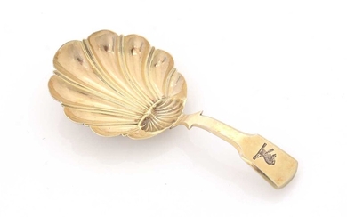 A George III caddy spoon.