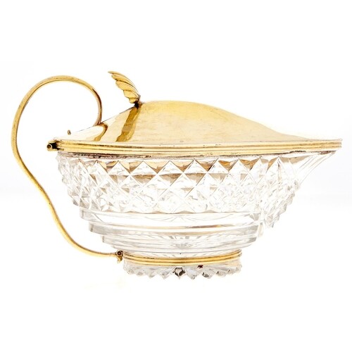A George III silver gilt mounted cut glass sauce boat, the d...