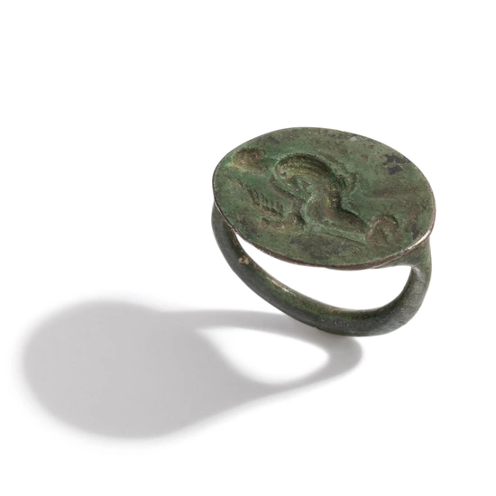 A Greek Bronze Finger Ring with Leda and the Swan