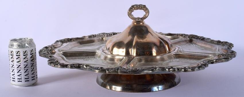 A LARGE ANTIQUE SILVER PLATED LAZY SUSAN with glass