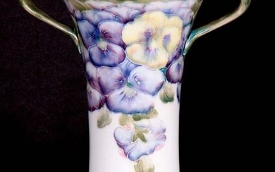 A LATE 19TH CENTURY MACINTYRE MOORCROFT FLARED TWO HANDLED VASE...