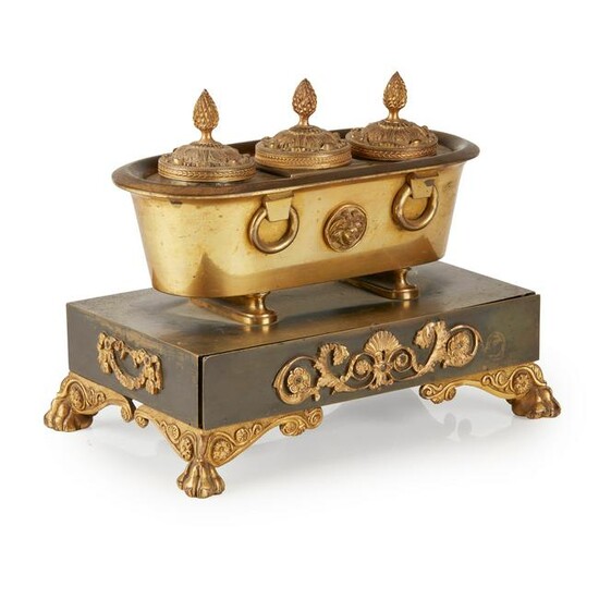 A LATE REGENCY GILT AND PATINATED BRONZE DESK STAND