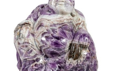 A Large Carved Amethyst Hotei