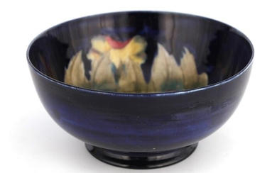 A MOORCROFT BURSLEM FOOTED BOWL decorated in the B