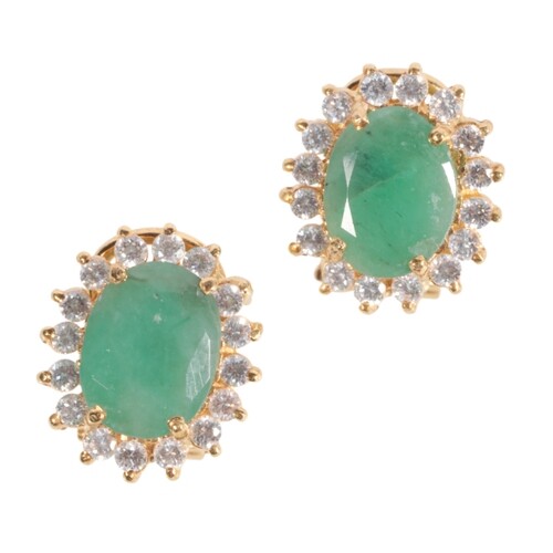 A PAIR OF GREEN AND CLEAR STONE CLUSTER EARRINGS the stud a...