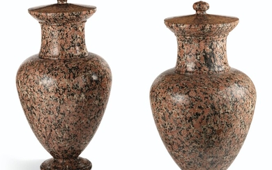 A PAIR OF NORTH EUROPEAN GRANITO ROSSO COVERED URNS