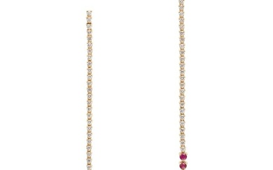 A PAIR OF RUBY AND DIAMOND DROP EARRINGS each comprising a row of round brilliant cut diamonds and