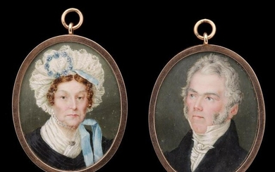 A PROPER PAIR OF PORTRAITS IN MATCHING LOCKET FRAMES