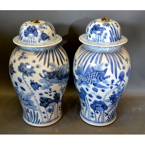 A Pair of Chinese Large Covered Vases decorated in underglaz...