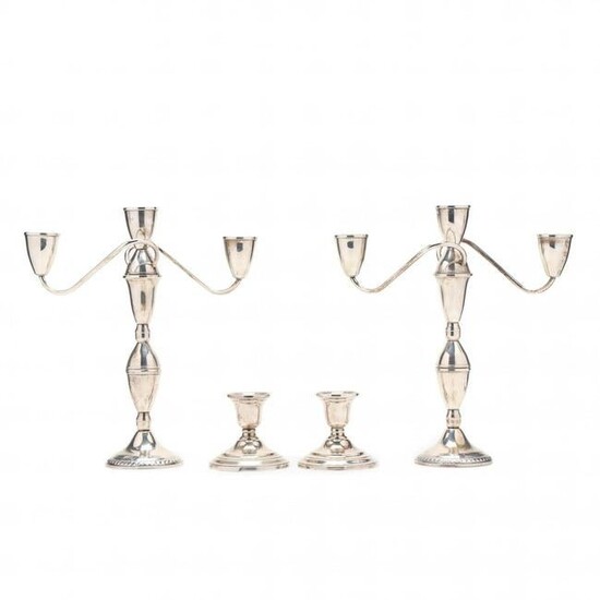 A Pair of Sterling Silver Candelabra and a Pair of