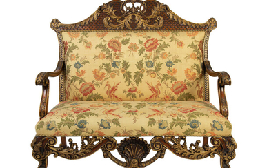 A Portuguese Carved Oak and Parcel Gilt Settee