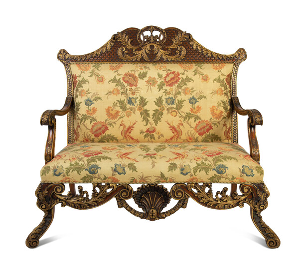 A Portuguese Carved Oak and Parcel Gilt Settee