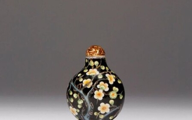 A RARE CHINESE ENAMELLED GLASS 'PRUNUS' SNUFF BOTTLE