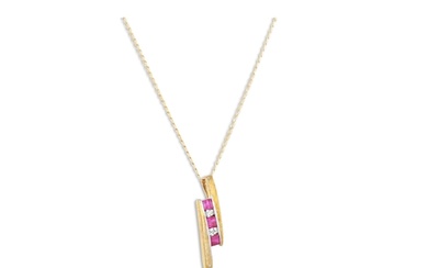 A RUBY AND DIAMOND PENDANT, mounted in 9ct yellow gold, on a...