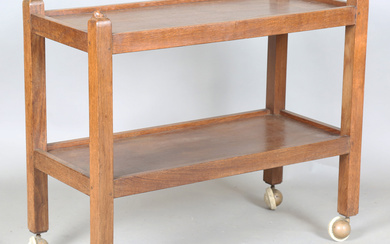 A Robert 'Mouseman' Thompson workshop oak two-tier trolley, one upright carved with mouse
