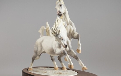 A Royal Worcester Doris Lindner model entitled "Galloping in Winter" Height: 14 in. (35.56 cm.) h.