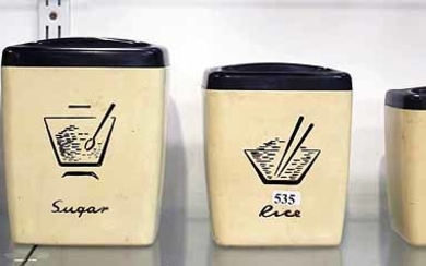 A SET OF FIVE NALLY KITCHEN CANISTERS