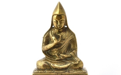 A Sino-Tibetan gilt-bronze seated figure of Tsong Ka Pa
