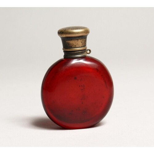 A VICTORIAN RUBY SCENT BOTTLE with silver top