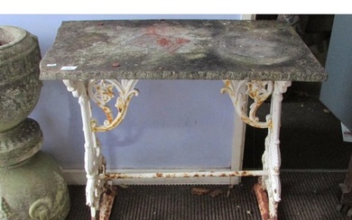 A Victorian cast iron tavern table, the scrolling trestle fr...