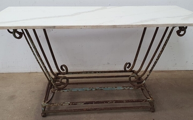 A WROUGHT IRON ART DECO STYLE TABLE