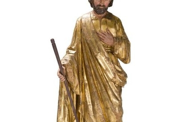 A carved and giltwood Santos figure