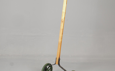 A cast iron hand mower with wooden handle, “Tanoent”, Norrahammars bruk, 1930's.