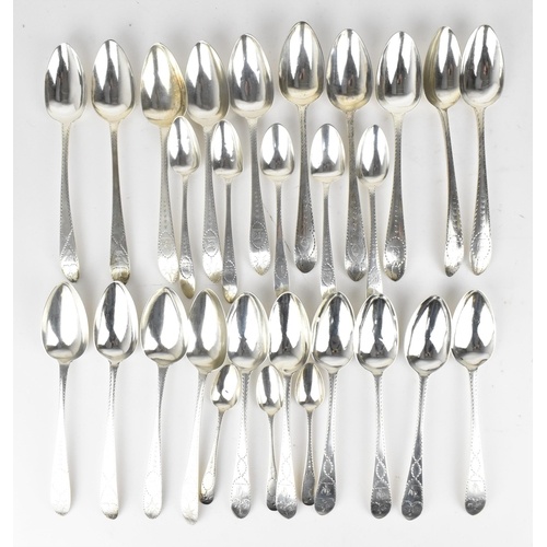 A collection of George III Irish silver tablespoons, compris...