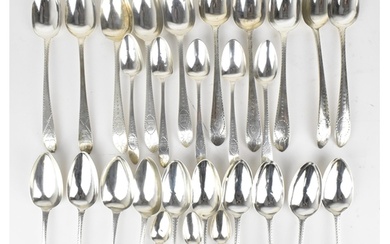 A collection of George III Irish silver tablespoons, compris...