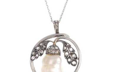 A cultured pearl and diamond pendant. The baroque