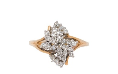 A diamond and 14k gold cluster ring