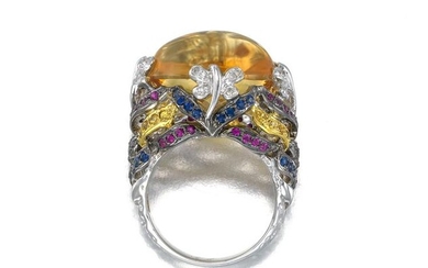 A gem-set dragonfly-motif ring