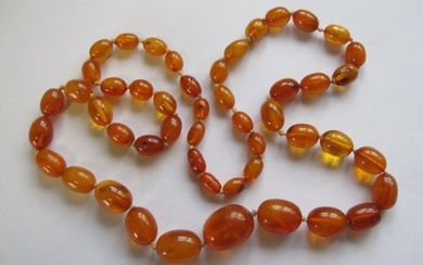 A graduated Amber Bead Necklace, approx 55gms