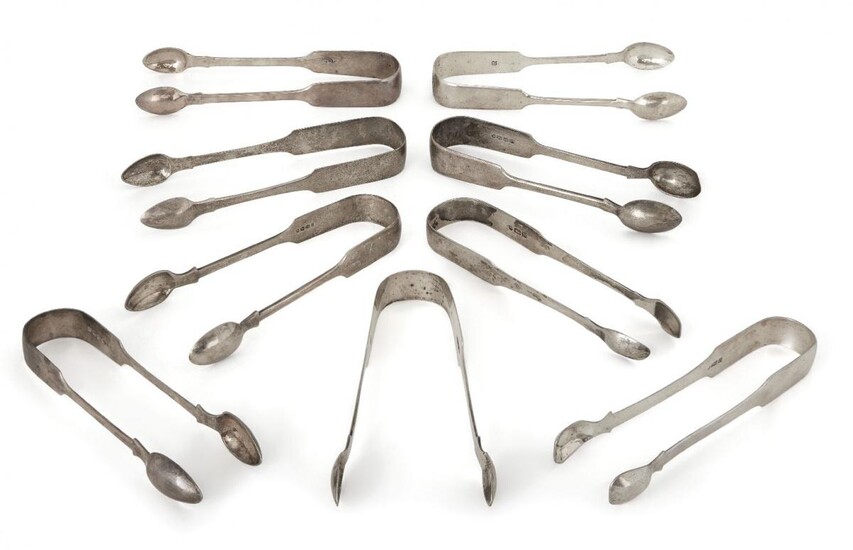 A group of Victorian silver sugar tongs, including four Exeter: c.1875 and 1879 Josiah Williams & Co.; c.1871, Thomas Hart Stone; c.1855, John Stone, each with monogram detail to arch, together with a further five pairs of Victorian silver tongs...